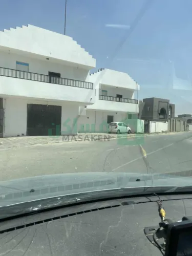مبنى سكنى وقطعه ارض