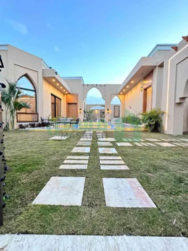 إستراحه واجهتين بالملحق vip بتصميم مراكشي يجمع بين